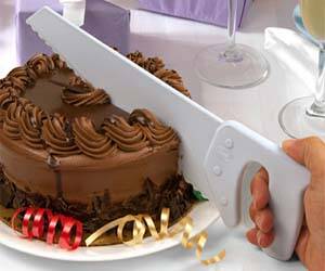 Hand Saw Cake Cutter - http://coolthings.us